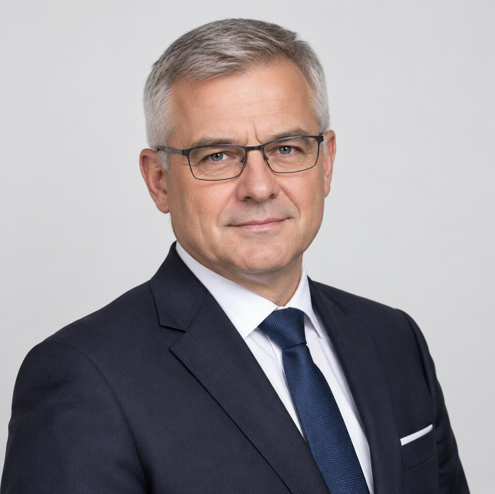 Studio portrait of a professional man in a formal suit